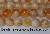 CAA1071 15.5 inches 6mm round sakura agate gemstone beads