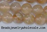 CAA1073 15.5 inches 10mm round sakura agate gemstone beads