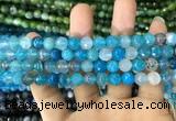 CAA1714 15 inches 8mm faceted round fire crackle agate beads