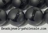 CAA3657 15.5 inches 10mm round matte & carved black agate beads