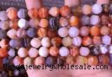 CAA3763 15.5 inches 10mm faceted nuggets mixed botswana agate beads