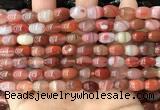 CAA4567 15.5 inches 7*10mm - 8*11mm rice south red agate beads