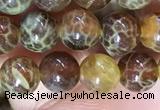 CAA5036 15.5 inches 4mm round yellow dragon veins agate beads