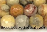 CAA5760 15 inches 6mm faceted round yellow crazy lace agate beads