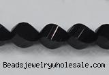 CAB336 15.5 inches 10*14mm faceted & twisted rice black agate beads