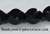 CAB338 15.5 inches 18*24mm faceted & twisted rice black agate beads