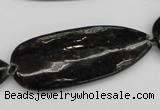 CAE72 15.5 inches 18*44mm flat teardrop astrophyllite beads wholesale