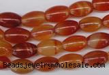 CAG1646 15.5 inches 8*12mm rice red agate gemstone beads