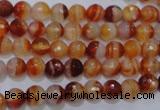 CAG2701 15.5 inches 6mm faceted round red line agate beads