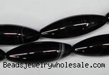 CAG2969 15.5 inches 10*30mm rice black line agate beads