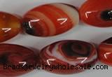 CAG3274 15.5 inches 16*30mm rice red line agate beads