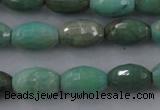 CAG3918 15.5 inches 6*10mm faceted rice green grass agate beads