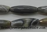 CAG3958 15.5 inches 10*30mm faceted rice grey botswana agate beads