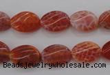 CAG4238 15.5 inches 10*14mm twisted oval natural fire agate beads