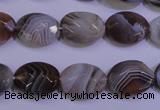 CAG4463 15.5 inches 12*16mm faceted oval botswana agate beads