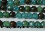 CAG4785 15.5 inches 4mm faceted round fire crackle agate beads