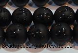 CAG6003 15.5 inches 10mm carved round matte black agate beads