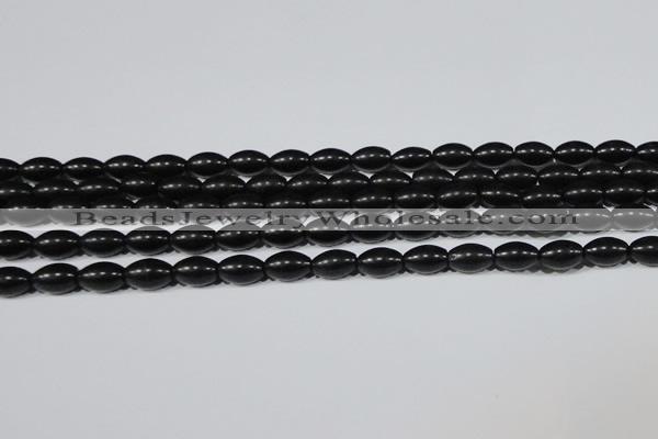 CAG6024 15.5 inches 6*9mm rice matte black agate beads