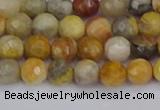 CAG9868 15.5 inches 4mm faceted round yellow crazy lace agate beads