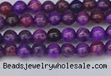 CAG9917 15.5 inches 4mm round purple crazy lace agate beads