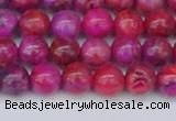 CAG9925 15.5 inches 6mm round fuchsia crazy lace agate beads