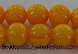 CAR404 15.5 inches 12mm round synthetic amber beads wholesale