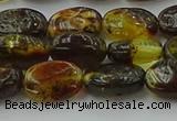 CAR546 15.5 inches 7*11mm - 8*12mm oval natural amber beads