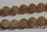 CBQ14 15.5 inches 10mm carved round strawberry quartz beads