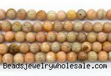 CCA553 15.5 inches 10mm round peach calcite gemstone beads