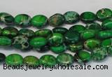 CDT178 15.5 inches 6*8mm oval dyed aqua terra jasper beads