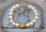 CFB1037 Hand-knotted 9mm - 10mm potato white freshwater pearl & yellow banded agate bracelet