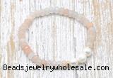 CFB710 faceted rondelle pink aventurine & potato white freshwater pearl stretchy bracelet