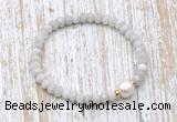 CFB721 faceted rondelle white crazy lace agate & potato white freshwater pearl stretchy bracelet