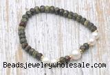 CFB744 faceted rondelle dragon blood jasper & potato white freshwater pearl stretchy bracelet