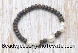 CFB756 faceted rondelle bronzite & potato white freshwater pearl stretchy bracelet