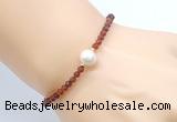 CFB812 4mm faceted round orange garnet & potato white freshwater pearl bracelet