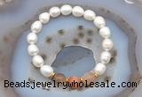 CFB913 9mm - 10mm rice white freshwater pearl & rainbow moonstone stretchy bracelet