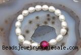 CFB916 9mm - 10mm rice white freshwater pearl & red tiger eye stretchy bracelet