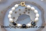 CFB923 Hand-knotted 9mm - 10mm rice white freshwater pearl & black banded agate bracelet