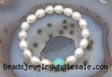 CFB926 9mm - 10mm rice white freshwater pearl & blue sea sediment jasper stretchy bracelet