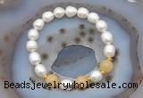 CFB928 9mm - 10mm rice white freshwater pearl & honey jade stretchy bracelet