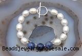 CFB930 Hand-knotted 9mm - 10mm rice white freshwater pearl & sodalite bracelet