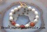 CFB961 Hand-knotted 9mm - 10mm rice white freshwater pearl & fire agate bracelet