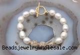 CFB967 Hand-knotted 9mm - 10mm rice white freshwater pearl & feldspar bracelet