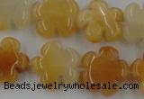 CFG1000 15.5 inches 16mm carved flower yellow jade beads