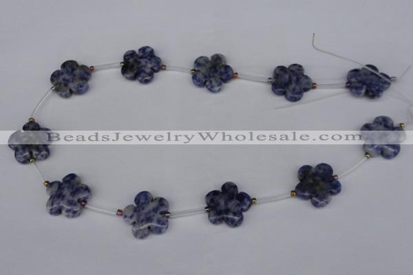 CFG1006 15.5 inches 20mm carved flower blue spot stone beads