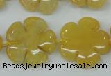 CFG458 15.5 inches 24mm carved flower yellow jade beads