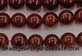 CGA602 15.5 inches 8mm A grade round natural orange garnet beads