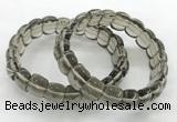 CGB3463 7.5 inches 10*14mm faceted oval smoky quartz bracelets