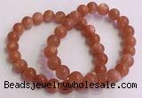 CGB4539 7.5 inches 9mm round golden sunstone beaded bracelets